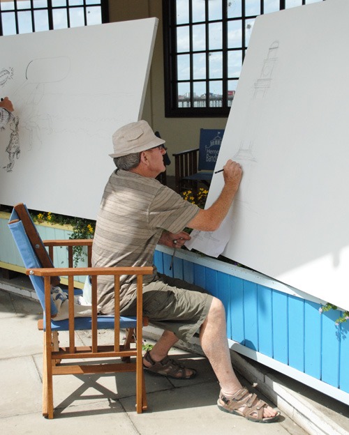 Martin Honeysett begins his big board cartoon at Herne Bay 2014