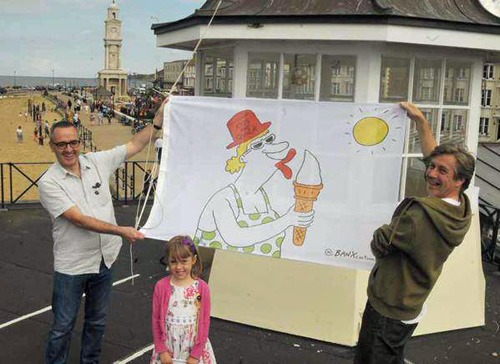Here's another of the flags from a few days earlier, the festival launch, with Royston Robertson, Nathan Ariss and Be a Francis, 8. Photo © Brian Green for the Herne Bay Times