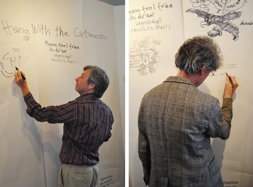 There was even some drawing on the walls by the cartoonists. Here's Nathan Ariss and Tim Sanders in action. Photo © Kasia Kowalska