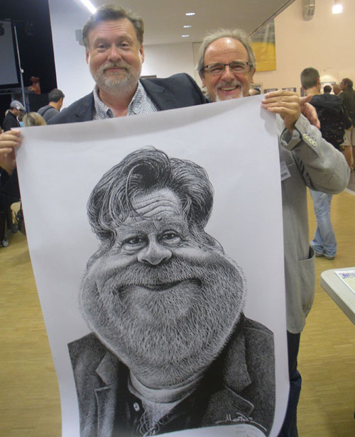 Daryl Cagle, left, with a caricature drawn by Philippe Moine, right